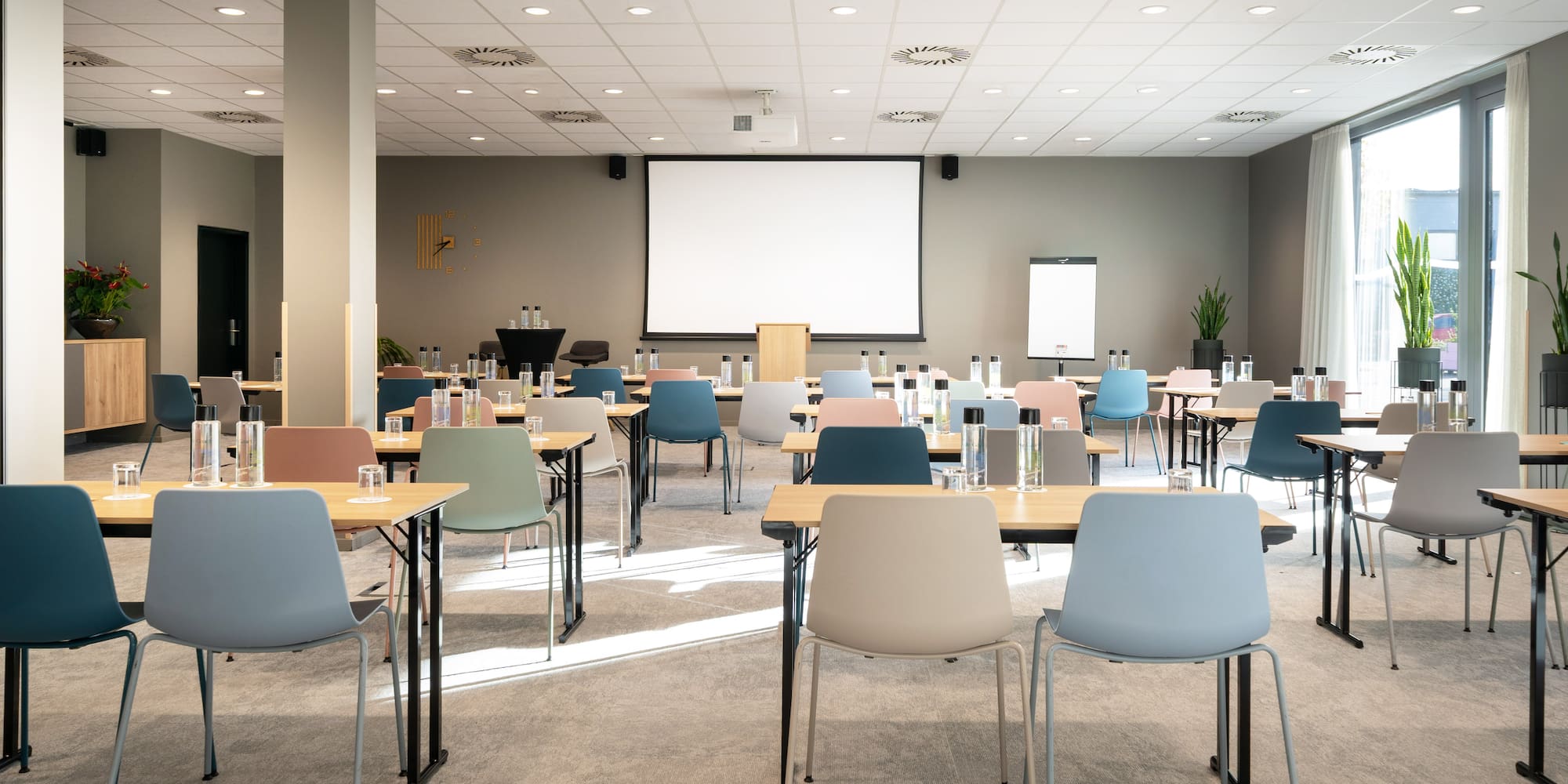 a room with tables and chairs