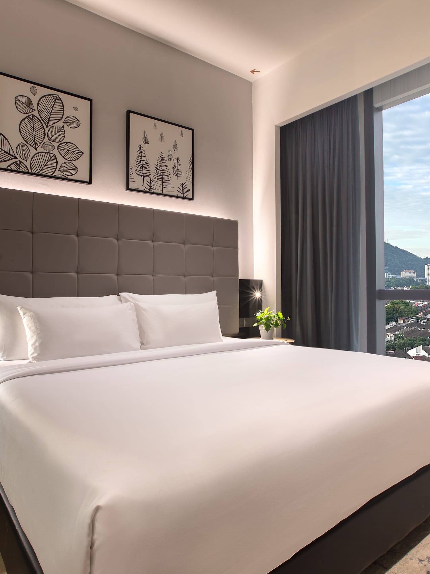 a bed with a large window