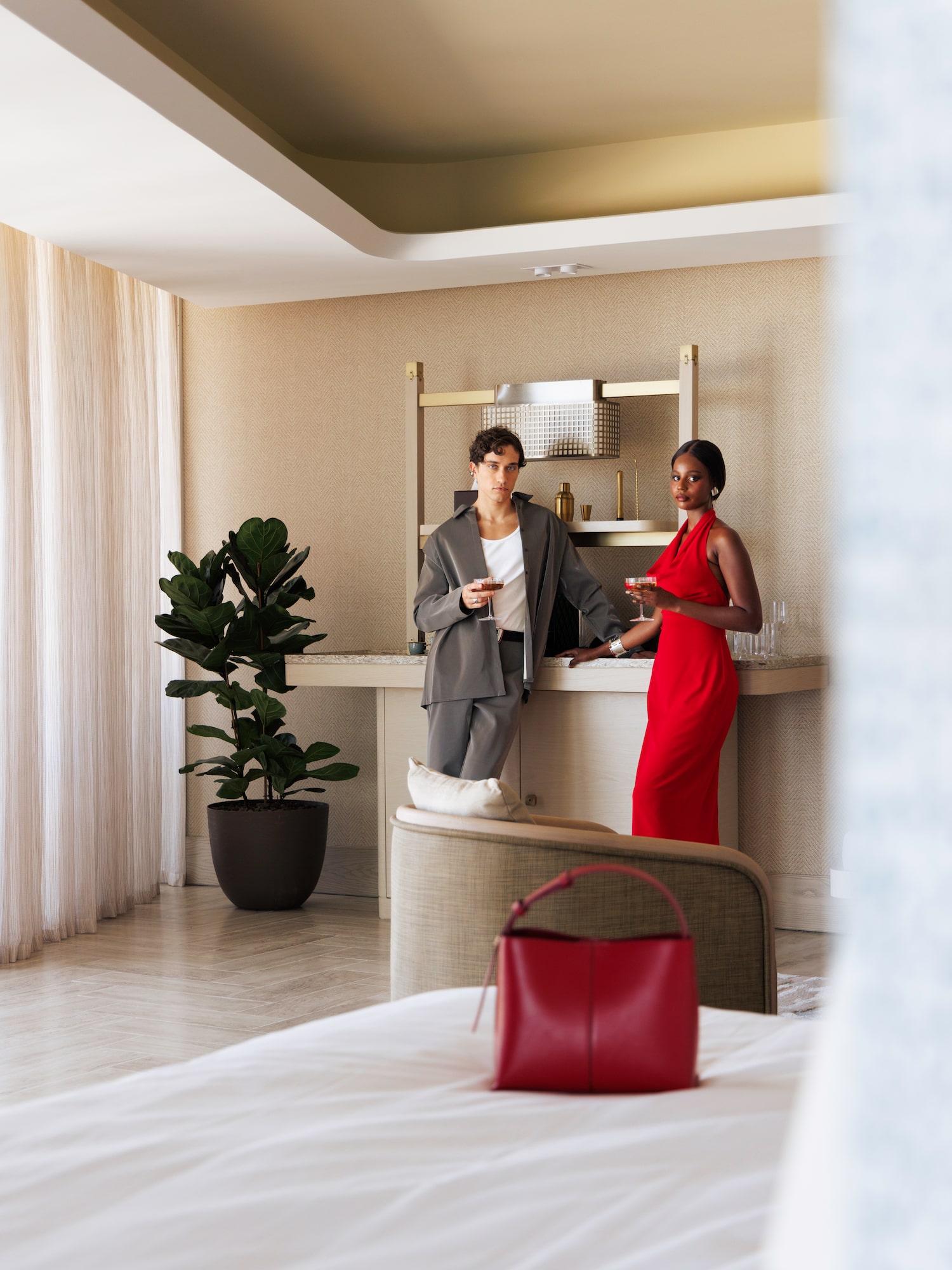 a man and woman standing in a room
