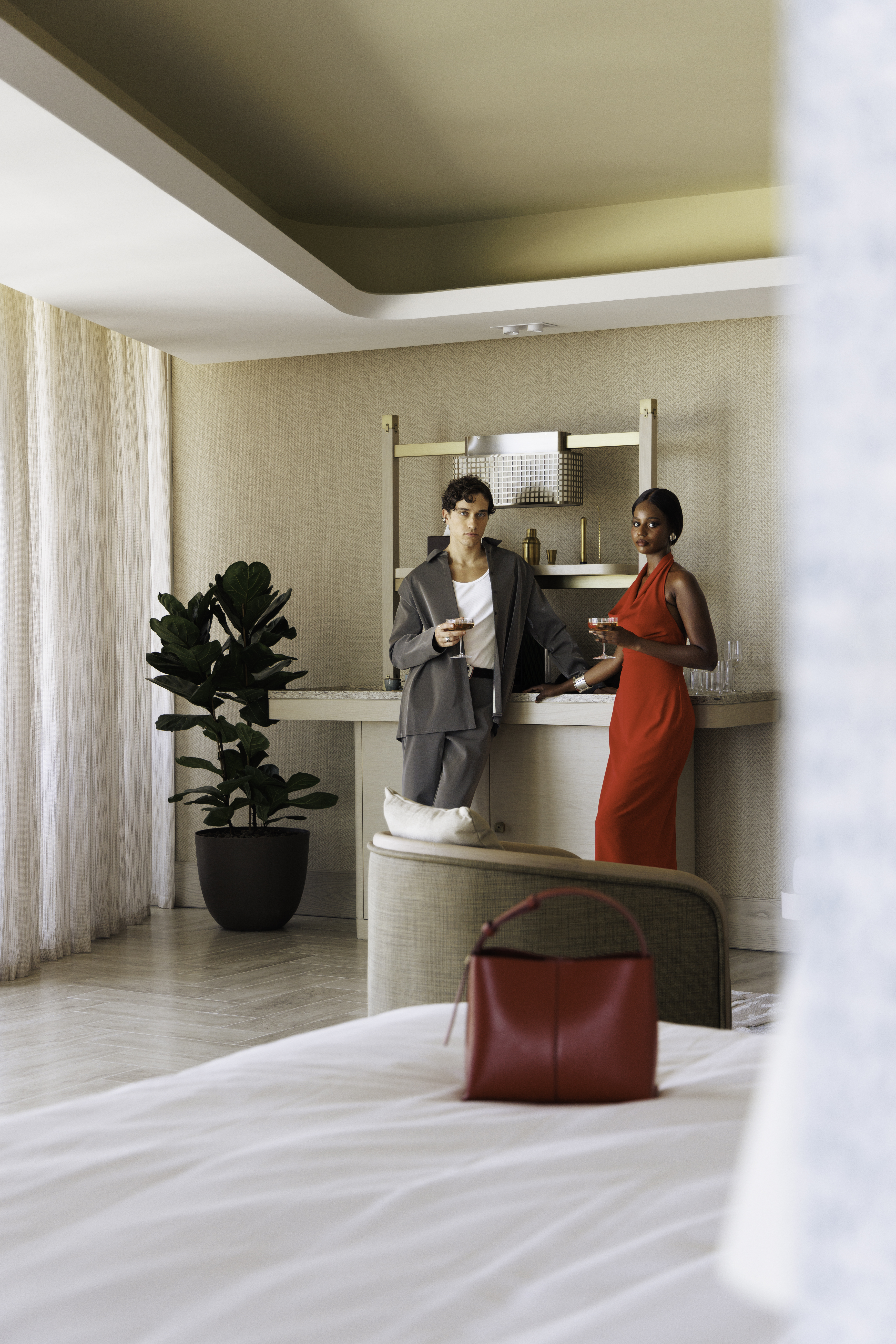 a man and woman standing in a room