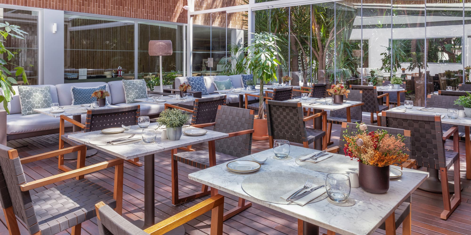 a restaurant with tables and chairs