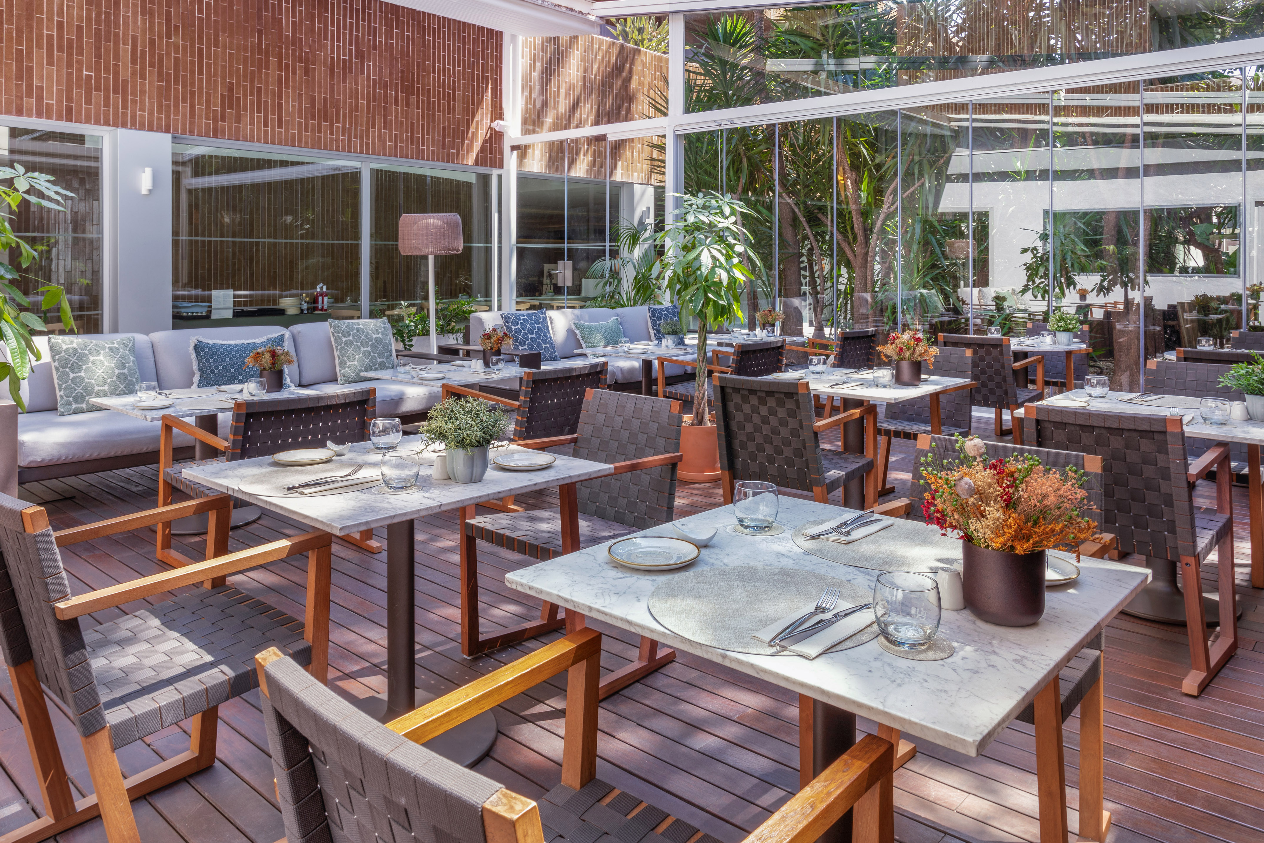 a restaurant with tables and chairs