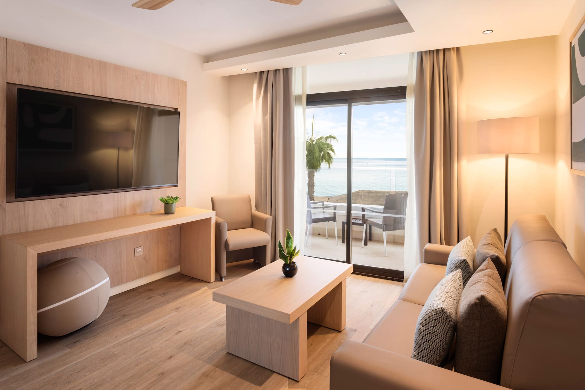 a room with a television and a table