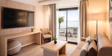 a room with a television and a table