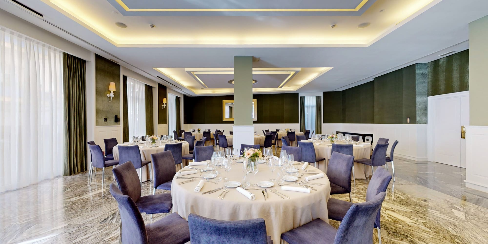 a room with tables and chairs