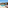 Modern hotel suite with private pool, sunbeds, and ocean view patio.
