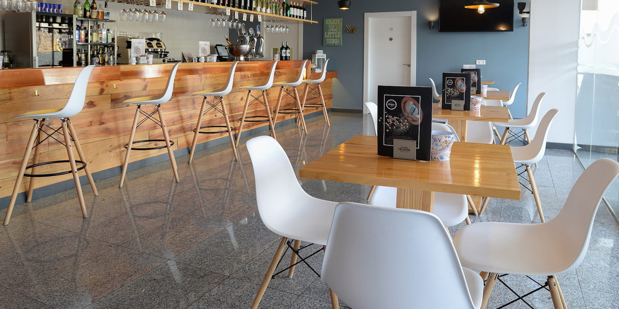 a room with tables and chairs