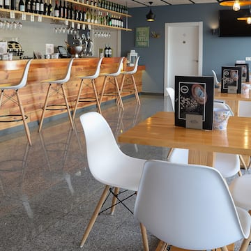 a room with tables and chairs