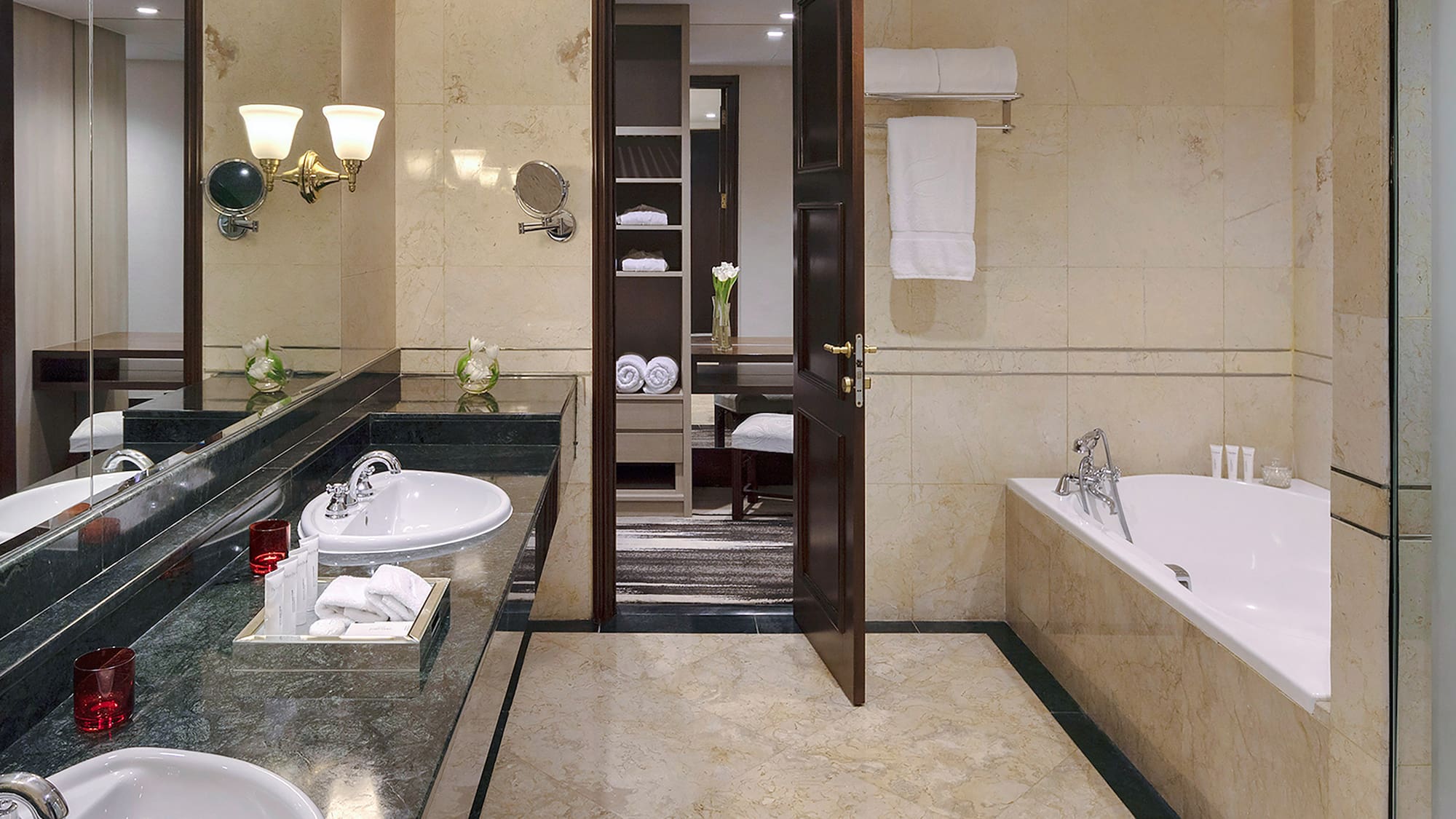 a bathroom with a bathtub and sink