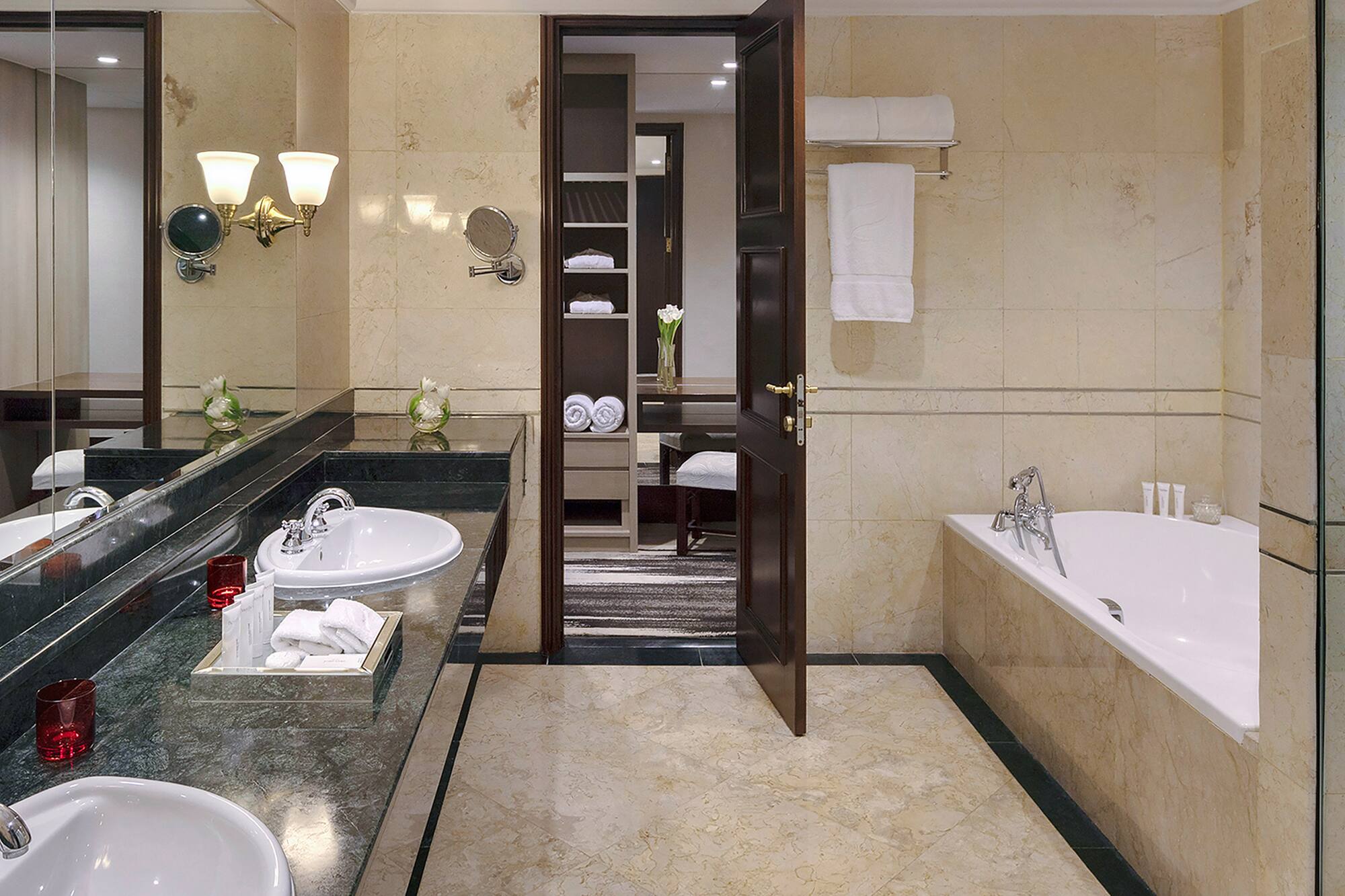 a bathroom with a bathtub and sink