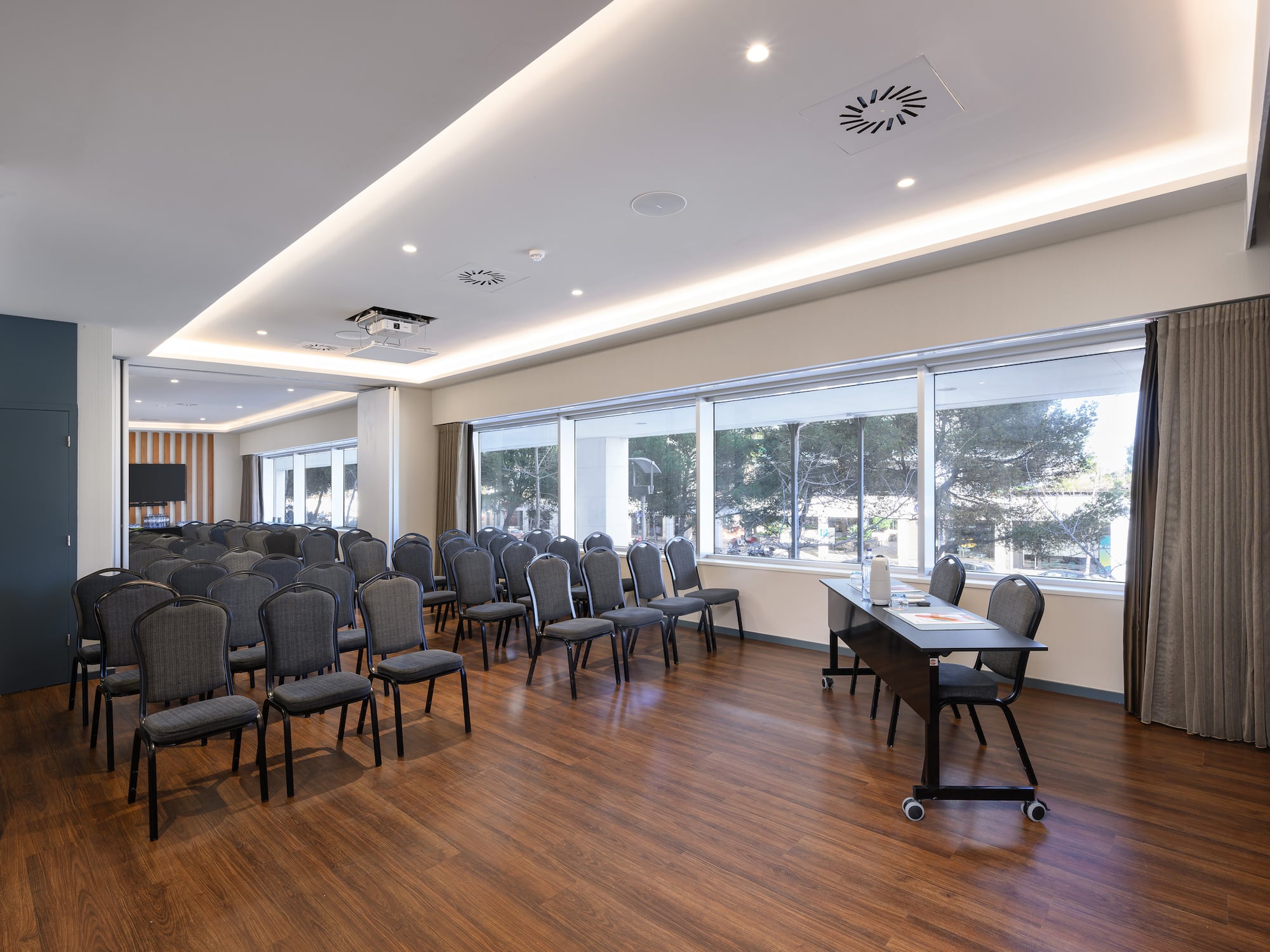 a room with chairs and a table