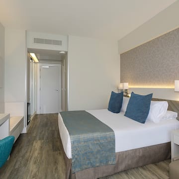 a room with a bed and a table