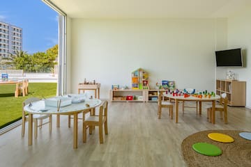 a room with tables and chairs