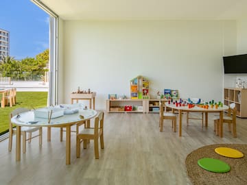 a room with tables and chairs