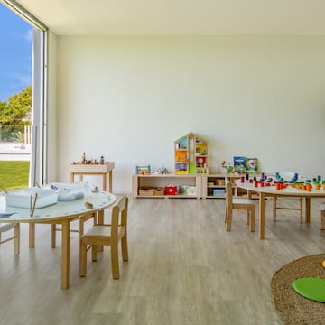 a room with tables and chairs