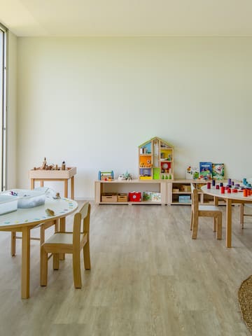 a room with tables and chairs