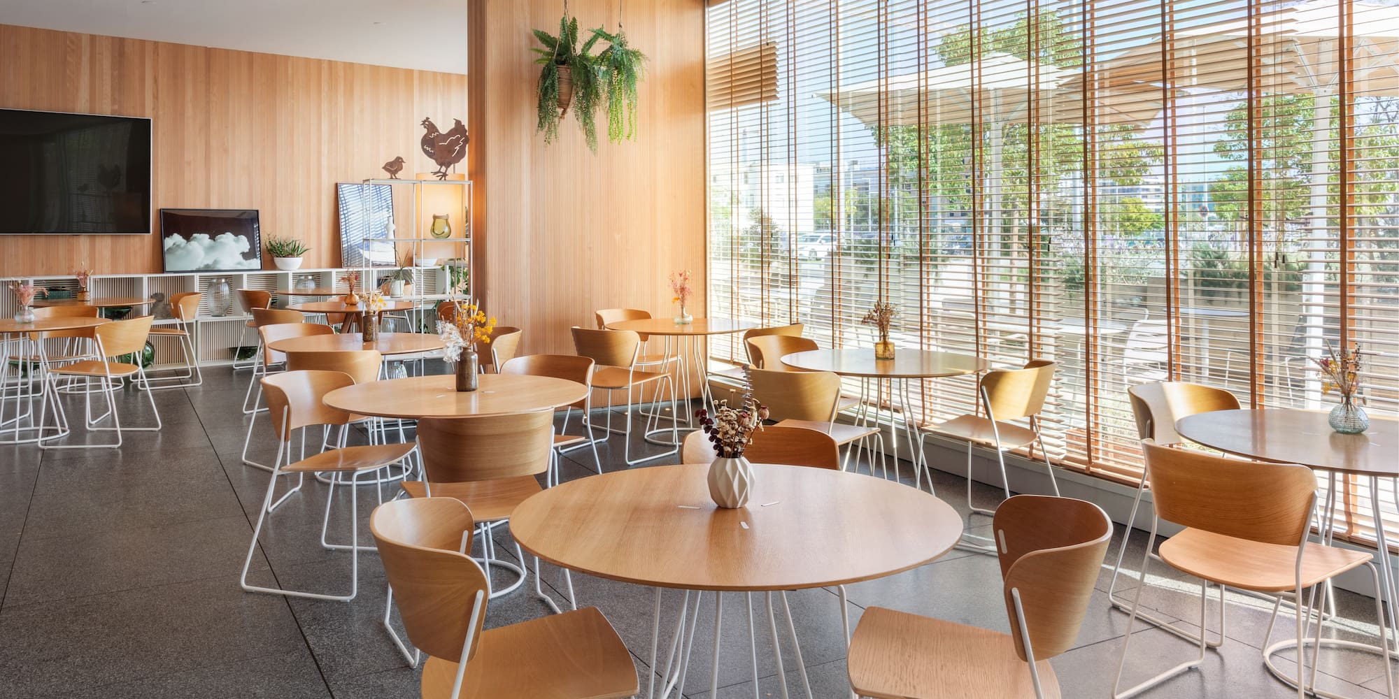 a room with tables and chairs