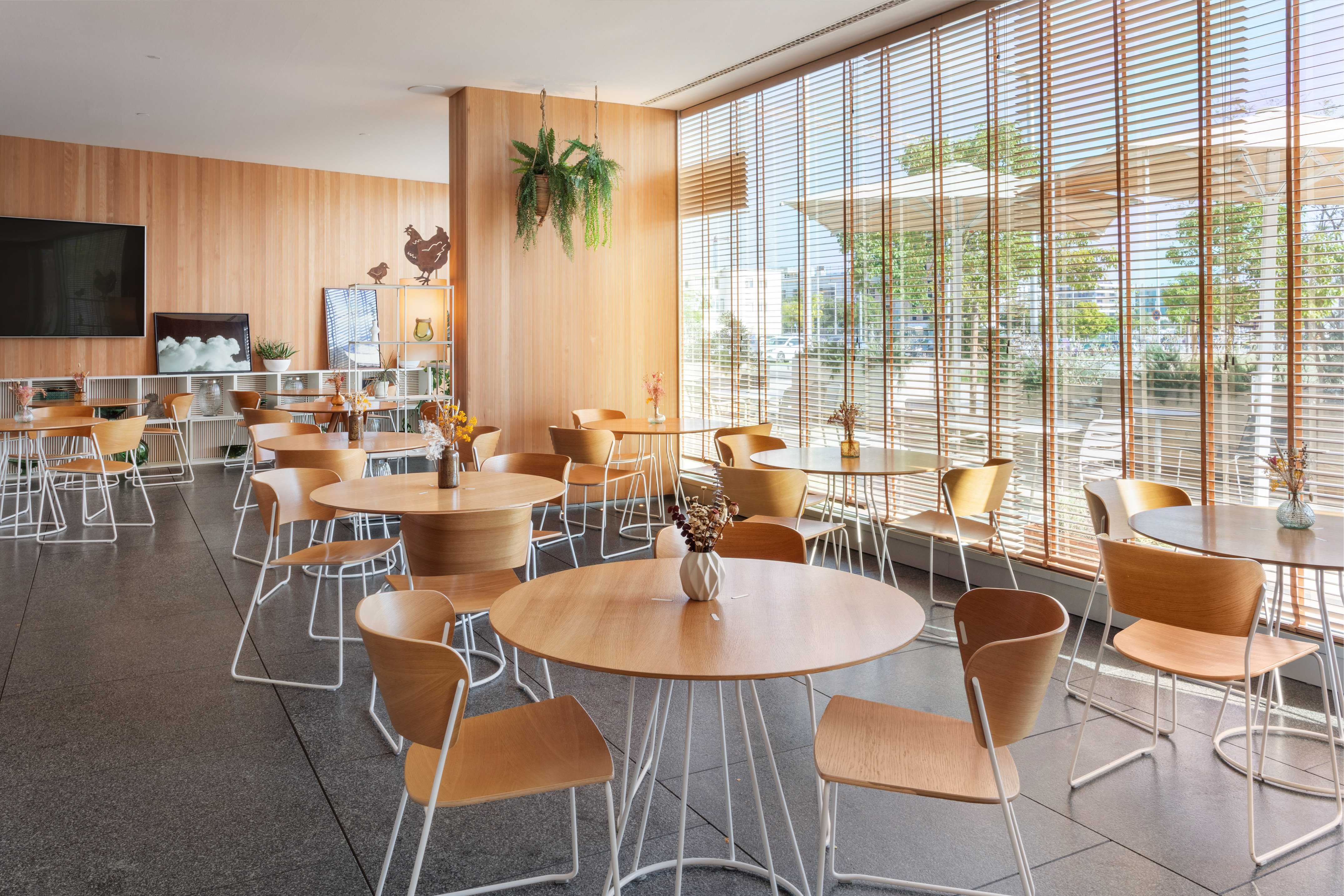 a room with tables and chairs