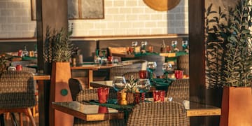 a restaurant with tables and chairs