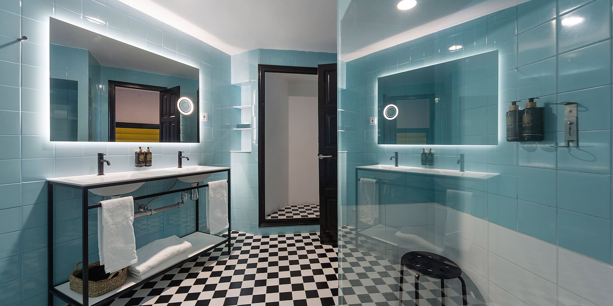 a bathroom with a mirror and a sink