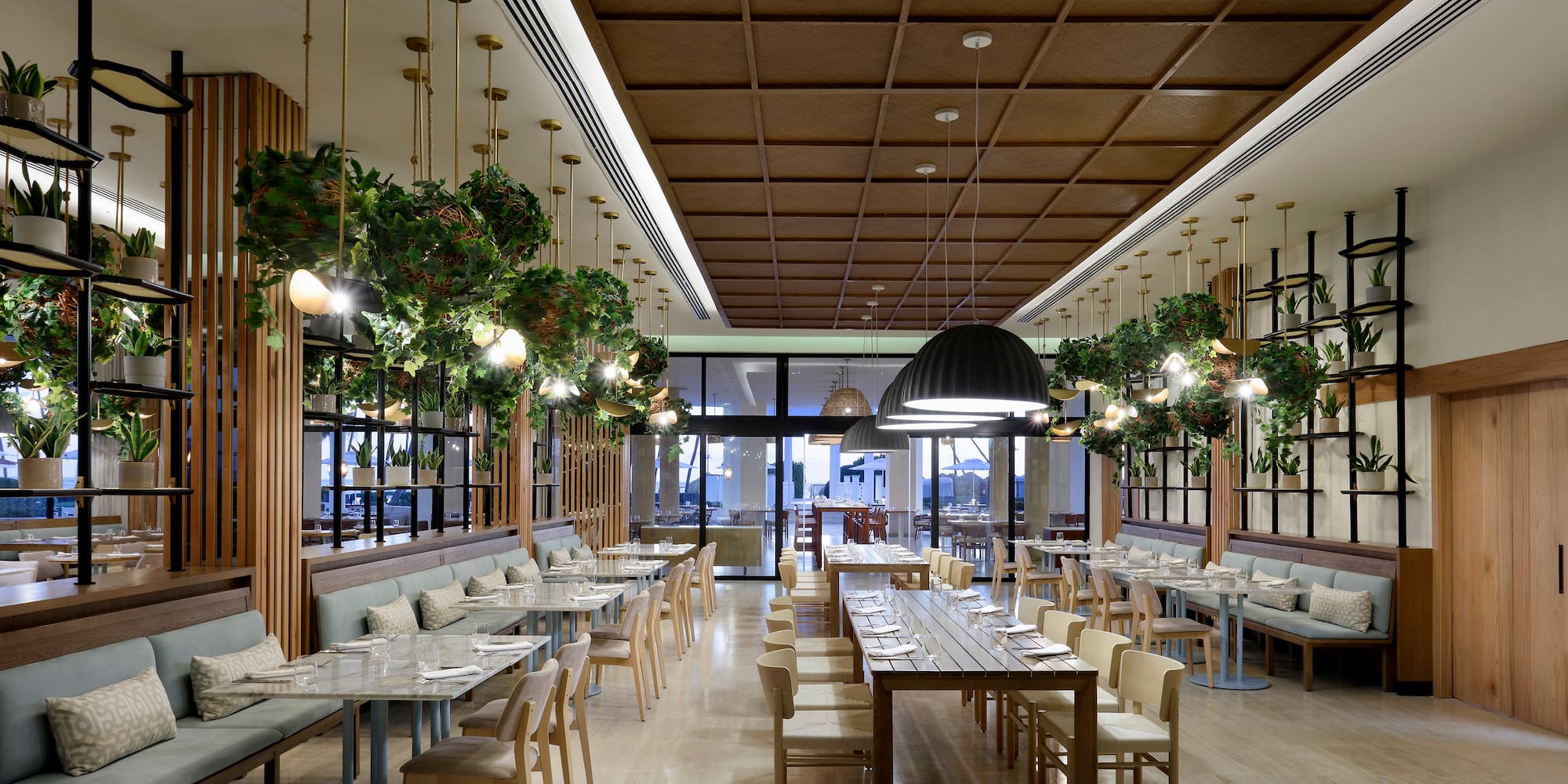 a restaurant with tables and chairs