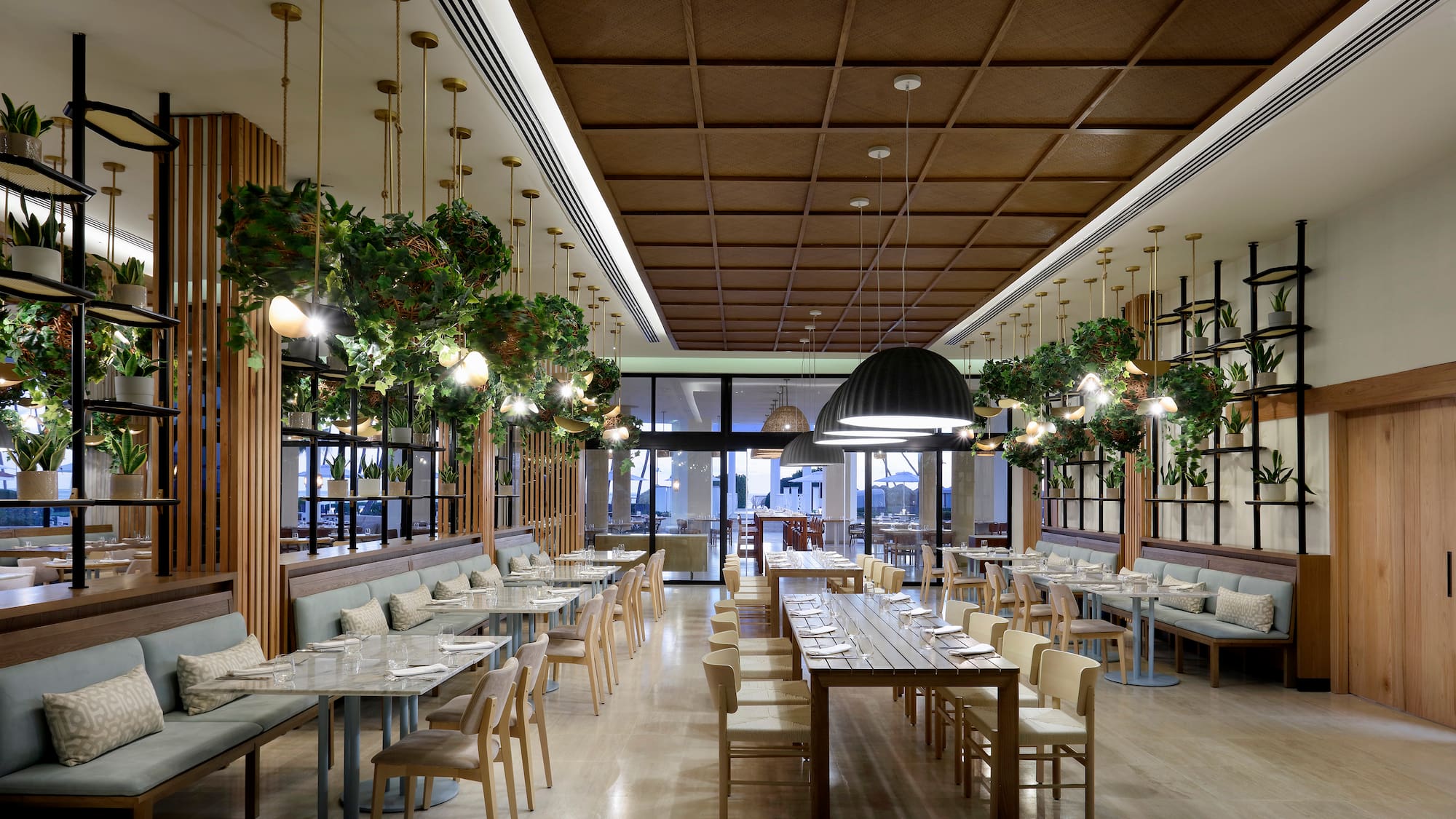 a restaurant with tables and chairs