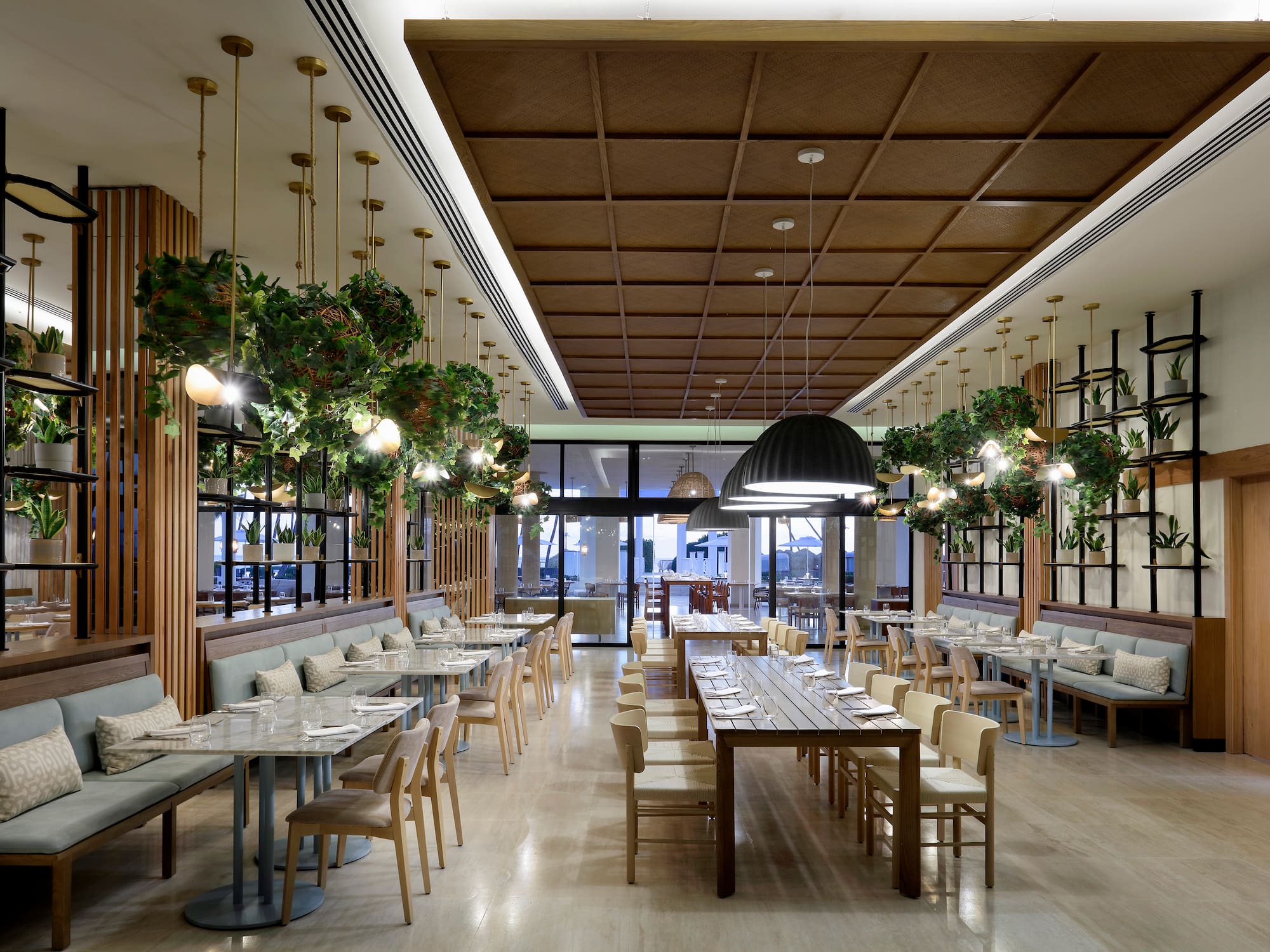 a restaurant with tables and chairs