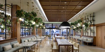 a restaurant with tables and chairs