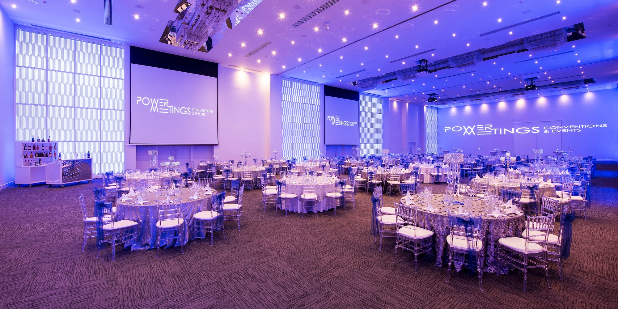 a large room with tables and chairs