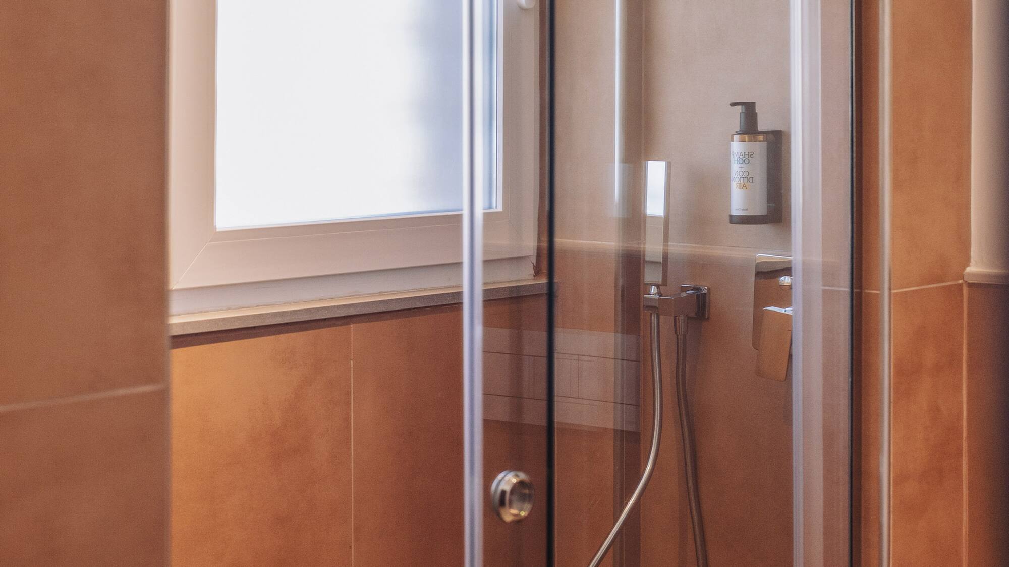 a shower with a glass door