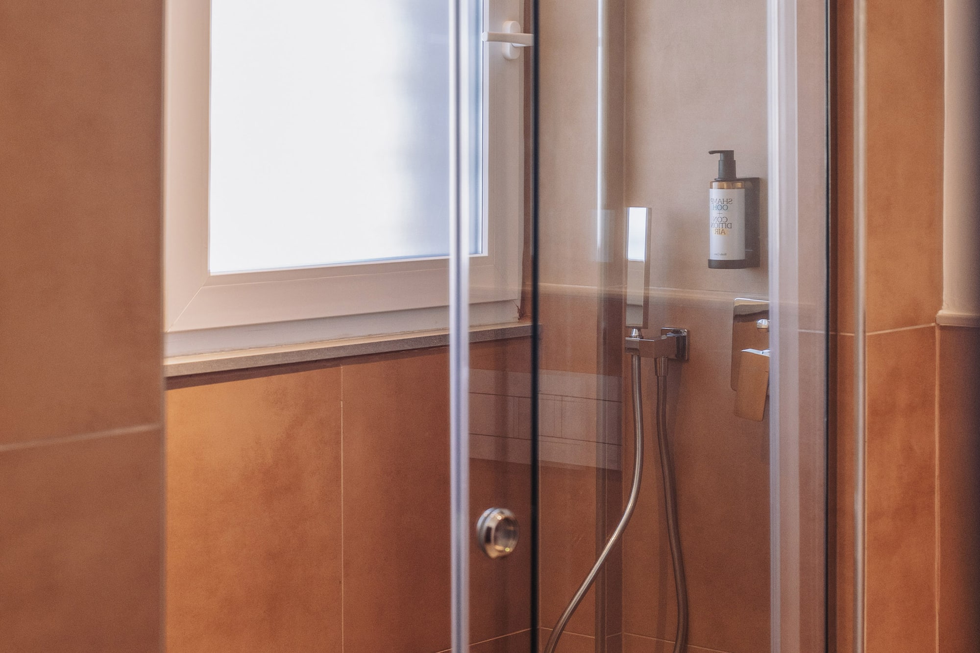 a shower with a glass door