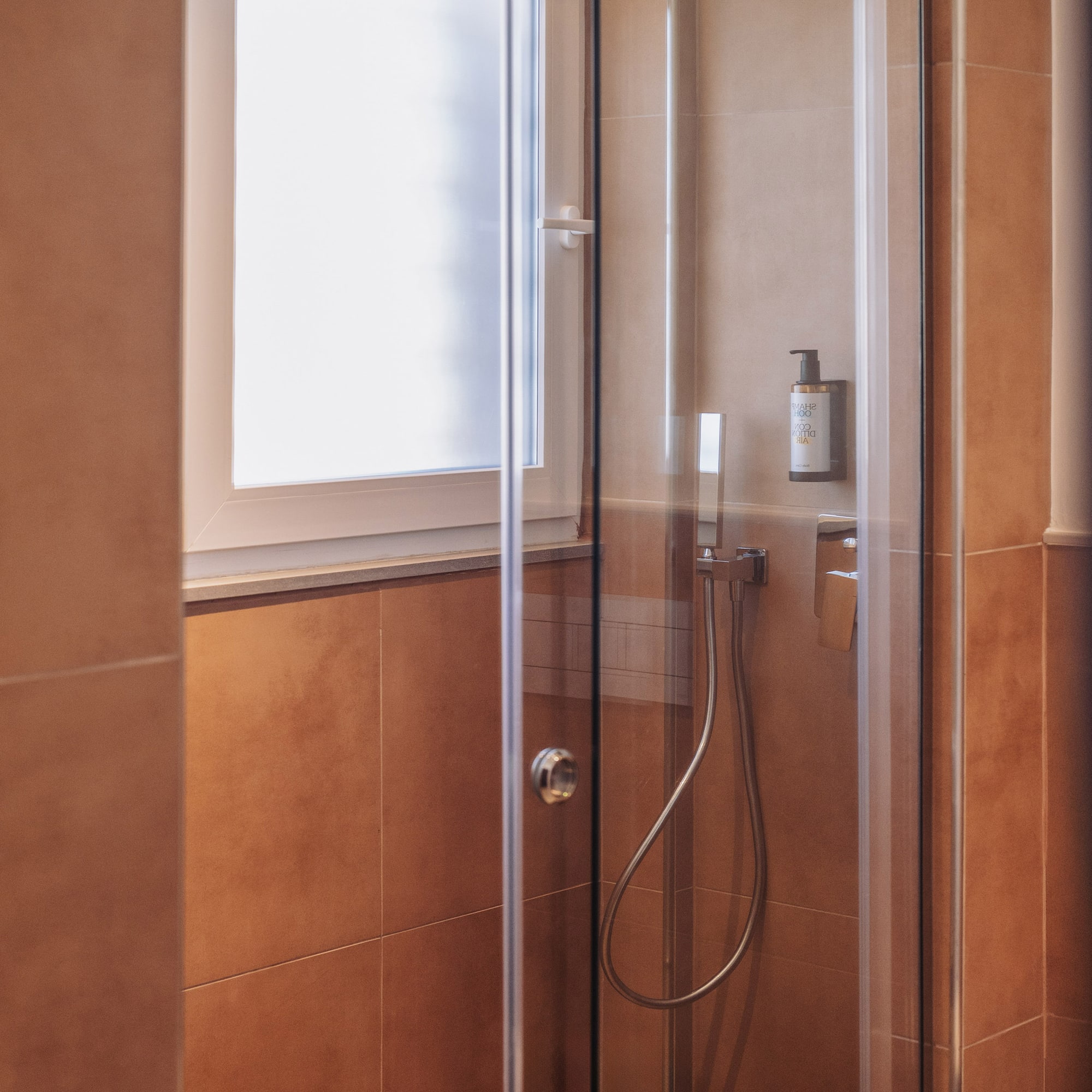 a shower with a glass door
