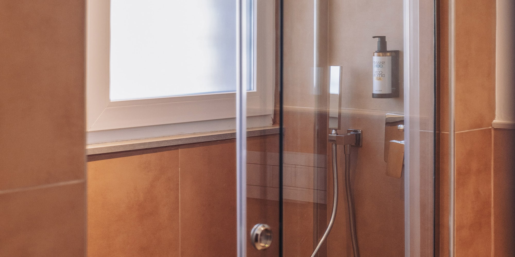 a shower with a glass door