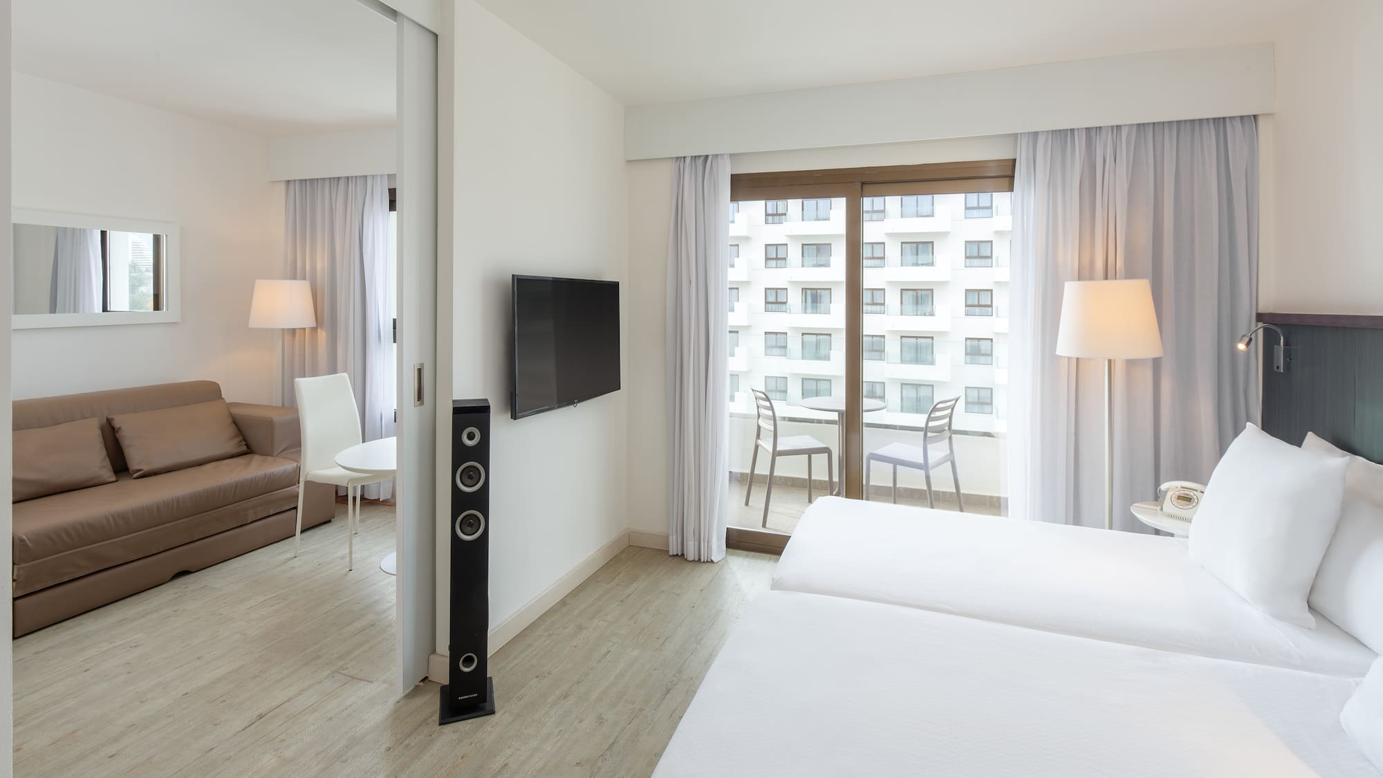 a room with a television and a couch