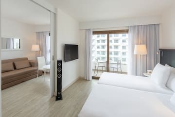 a room with a television and a couch
