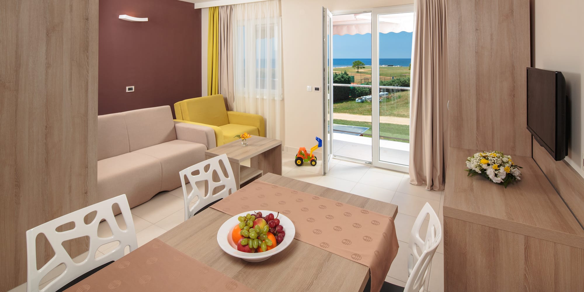 a room with a table and chairs