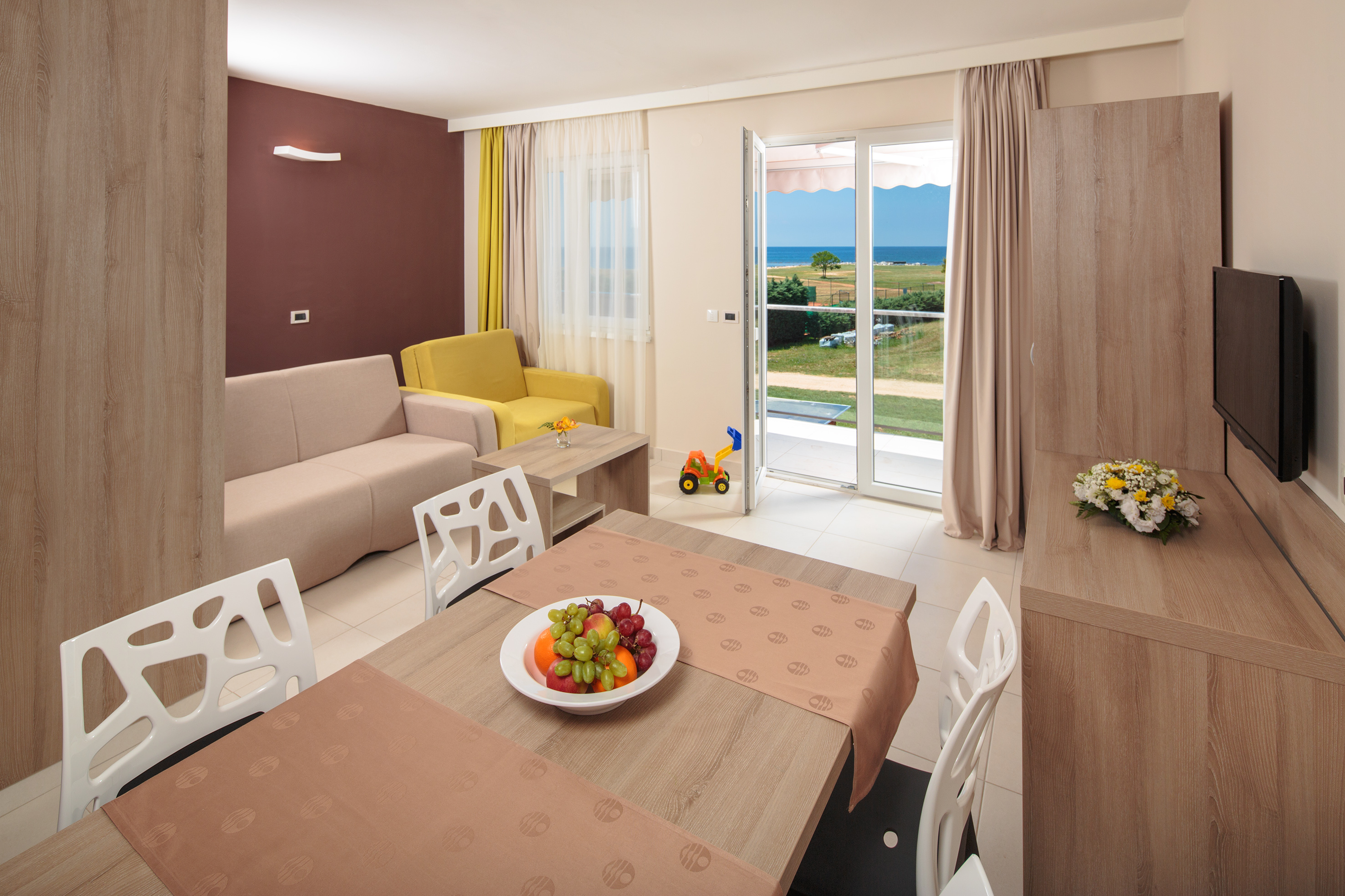 a room with a table and chairs