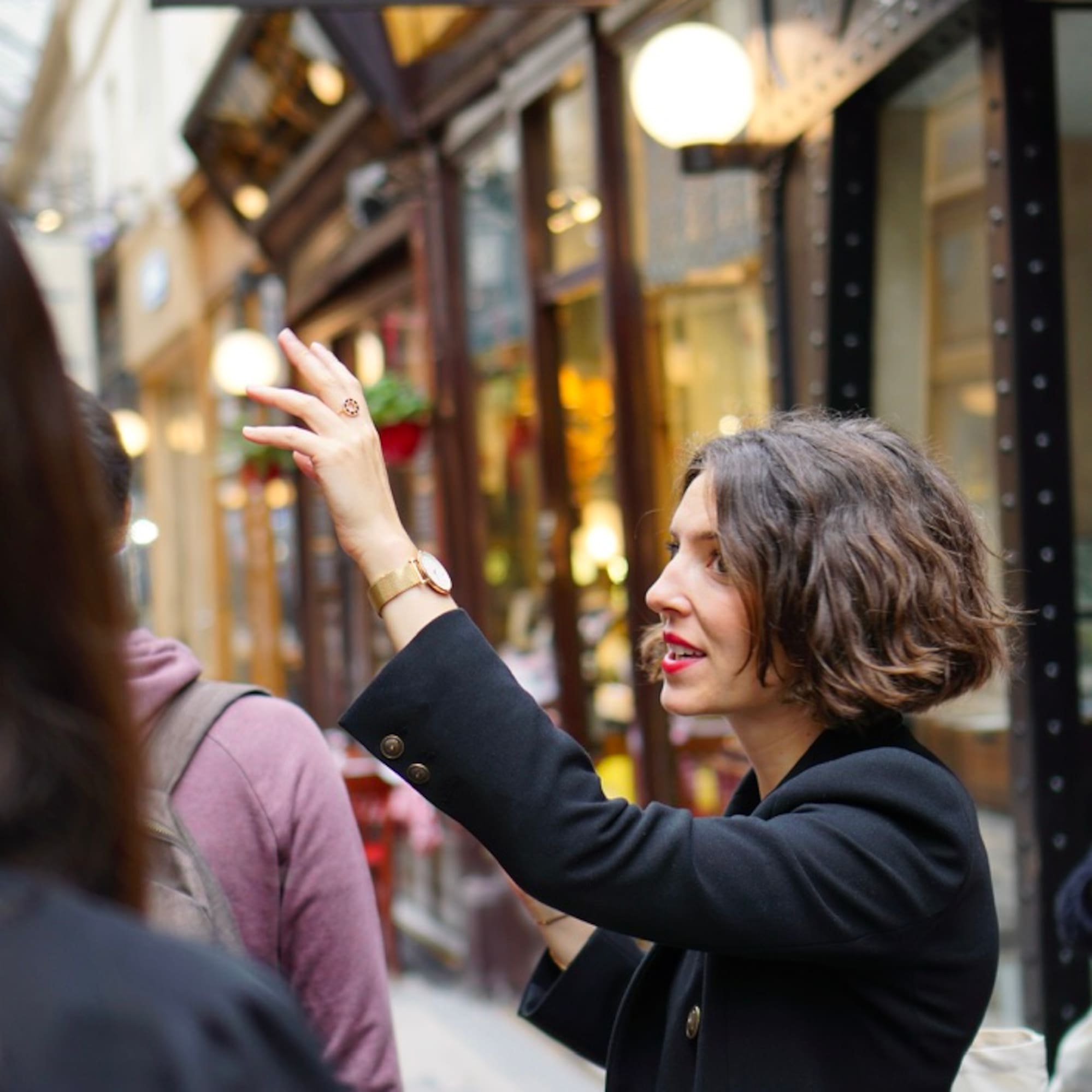 a woman in a black coat
