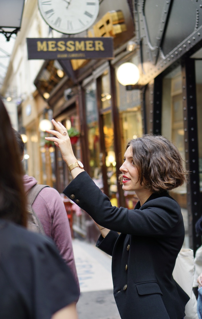 a woman in a black coat