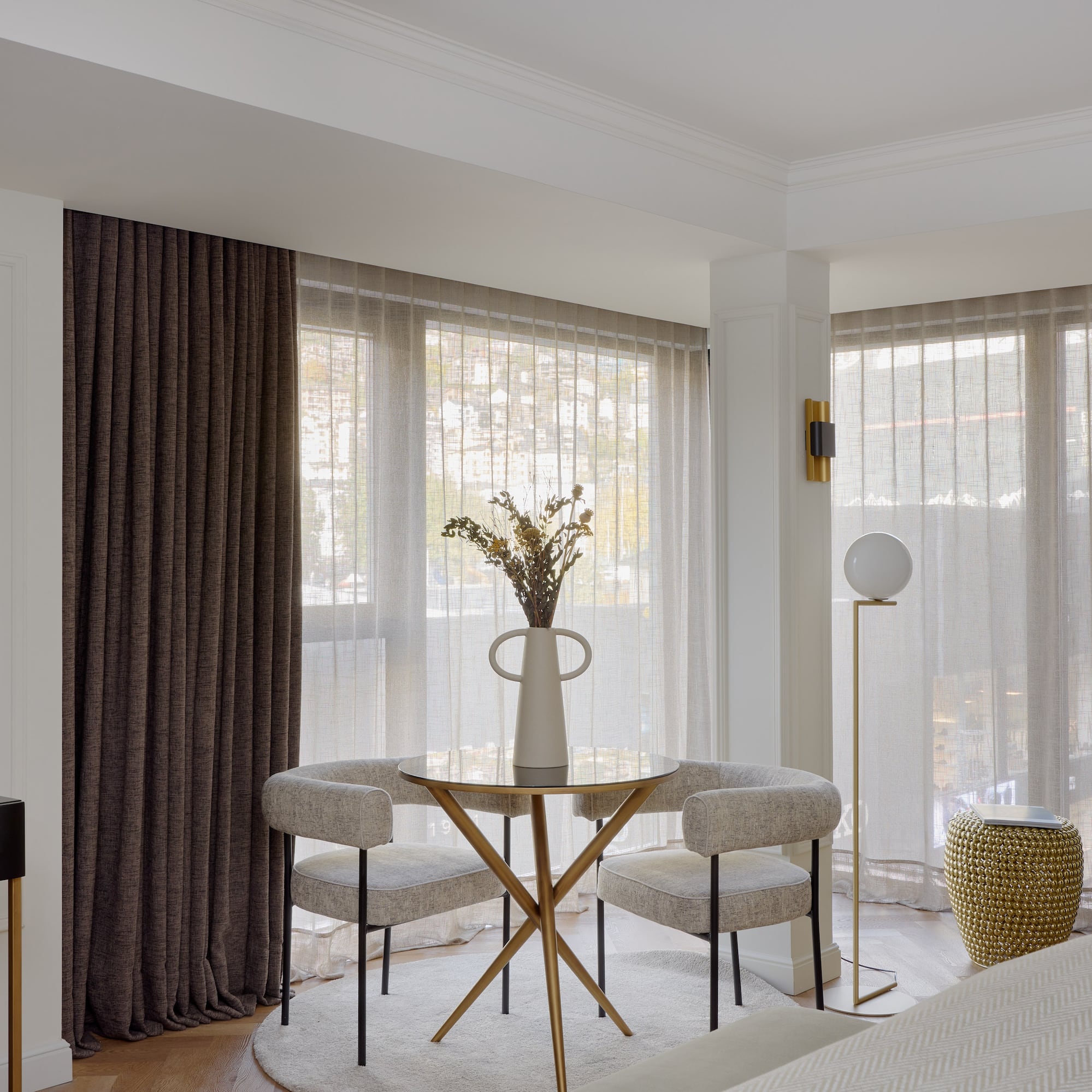 a room with a table and chairs