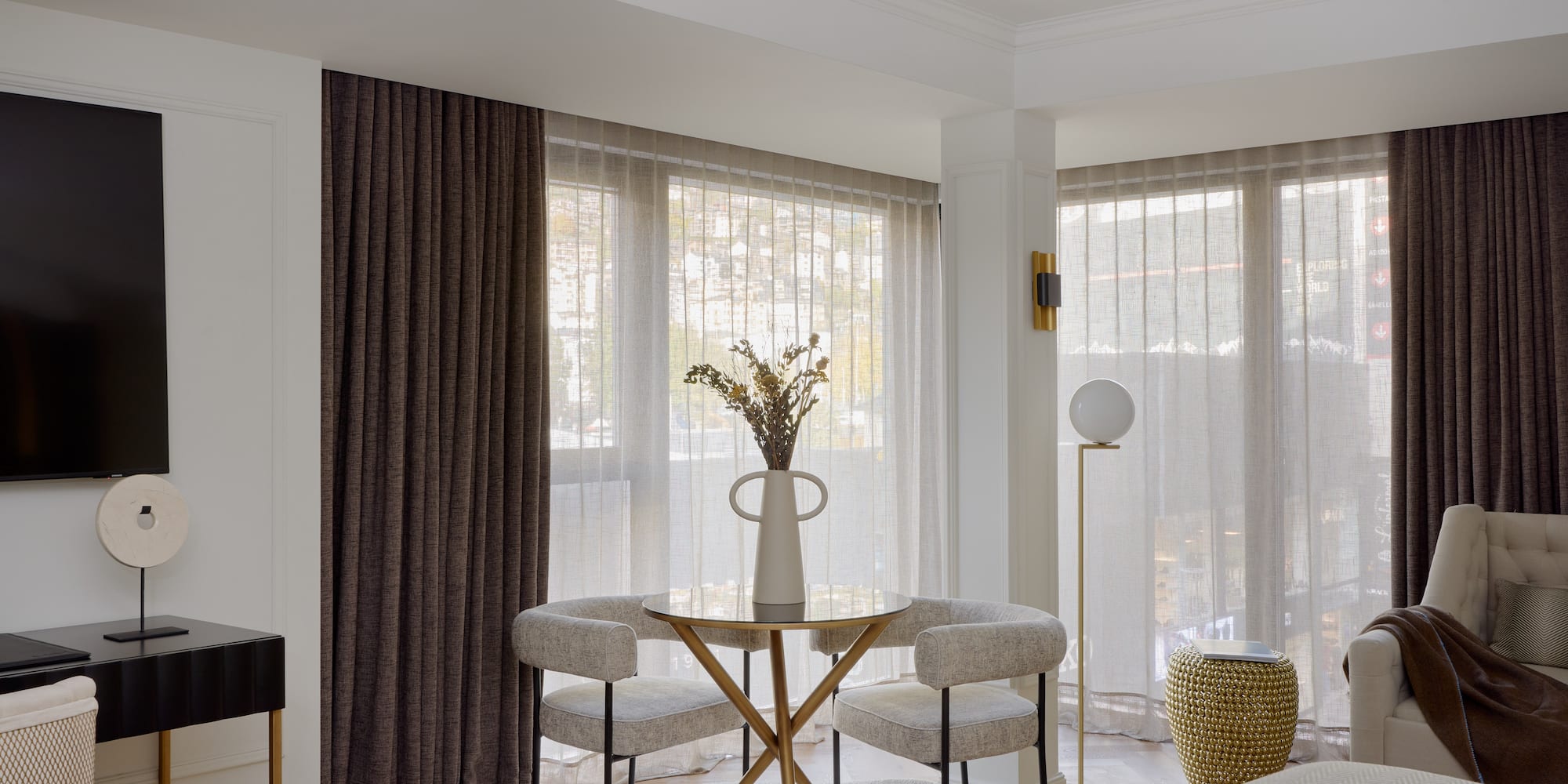 a room with a table and chairs