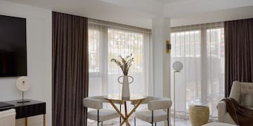 a room with a table and chairs