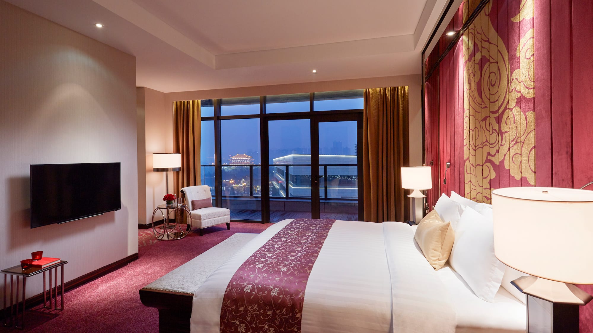 a room with a bed and a fireplace