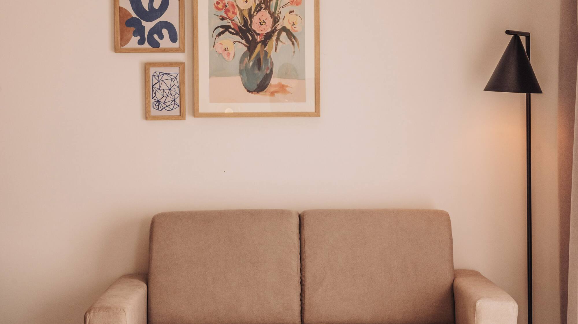 a couch and a lamp in a room