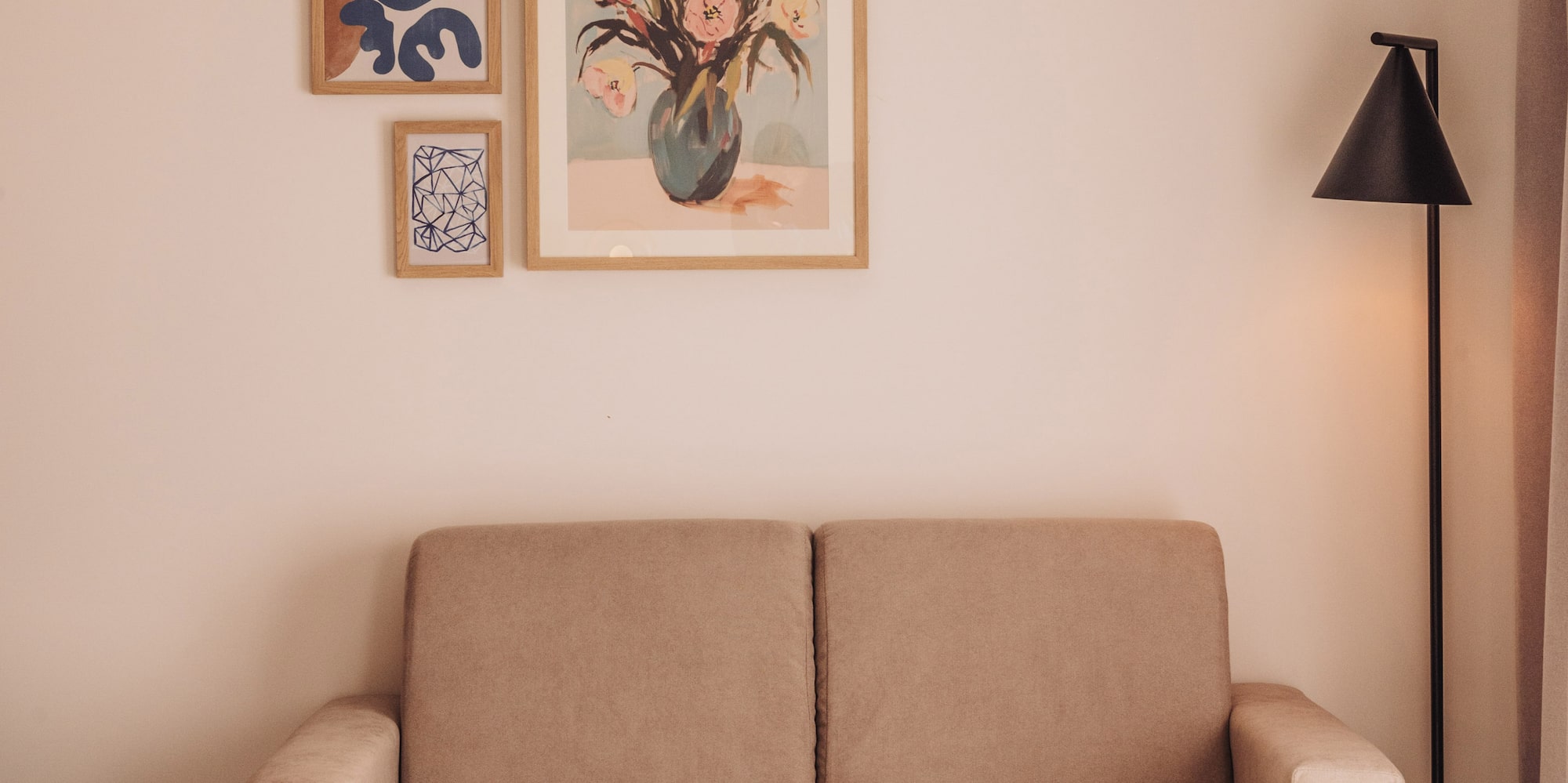 a couch and a lamp in a room