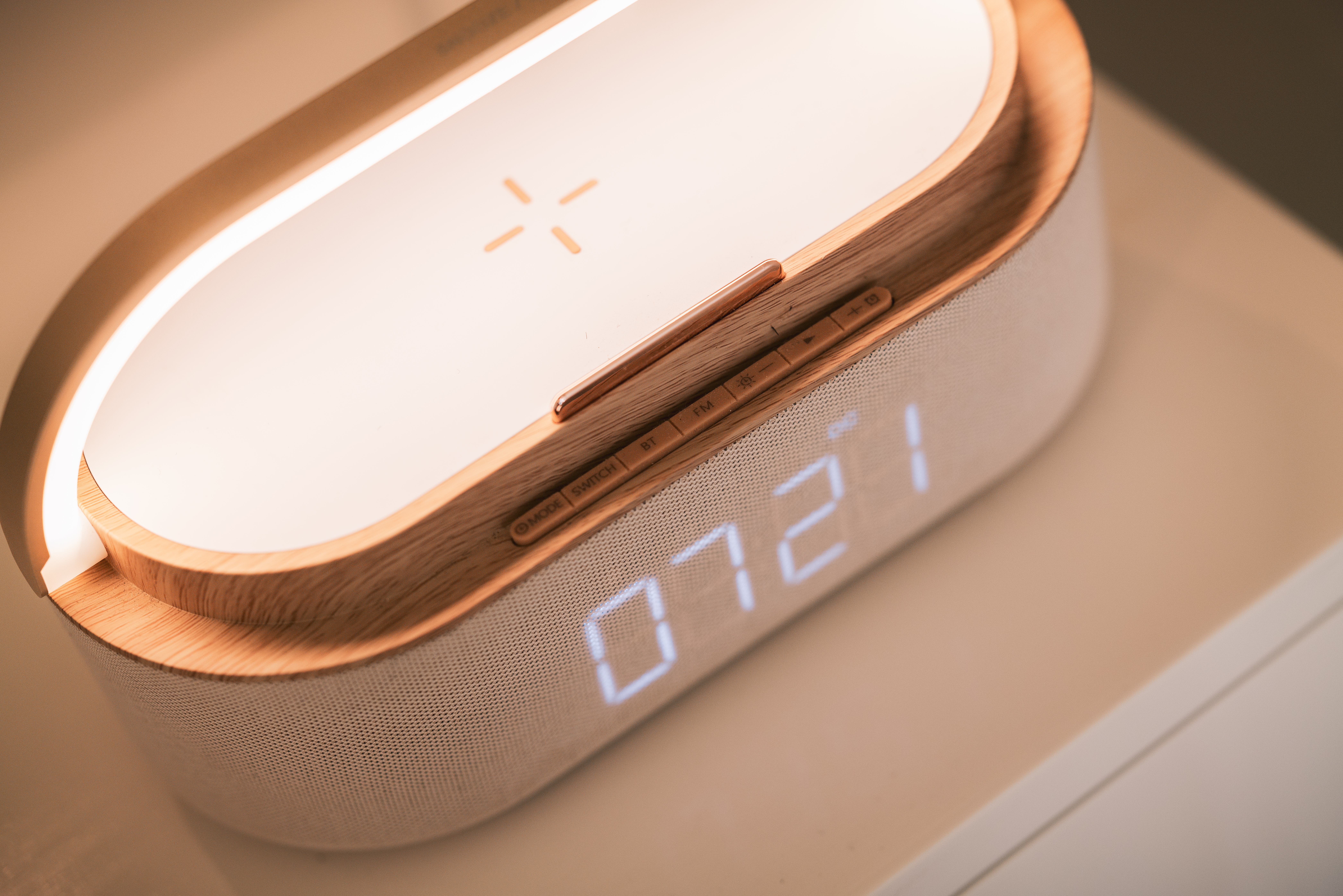 Wood smart alarm clock with LED lamp, wireless charger, Bluetooth speaker.