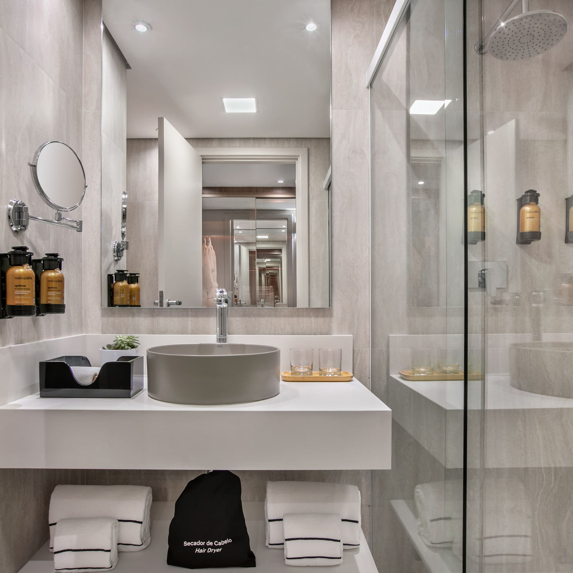 a bathroom with a shower and sink