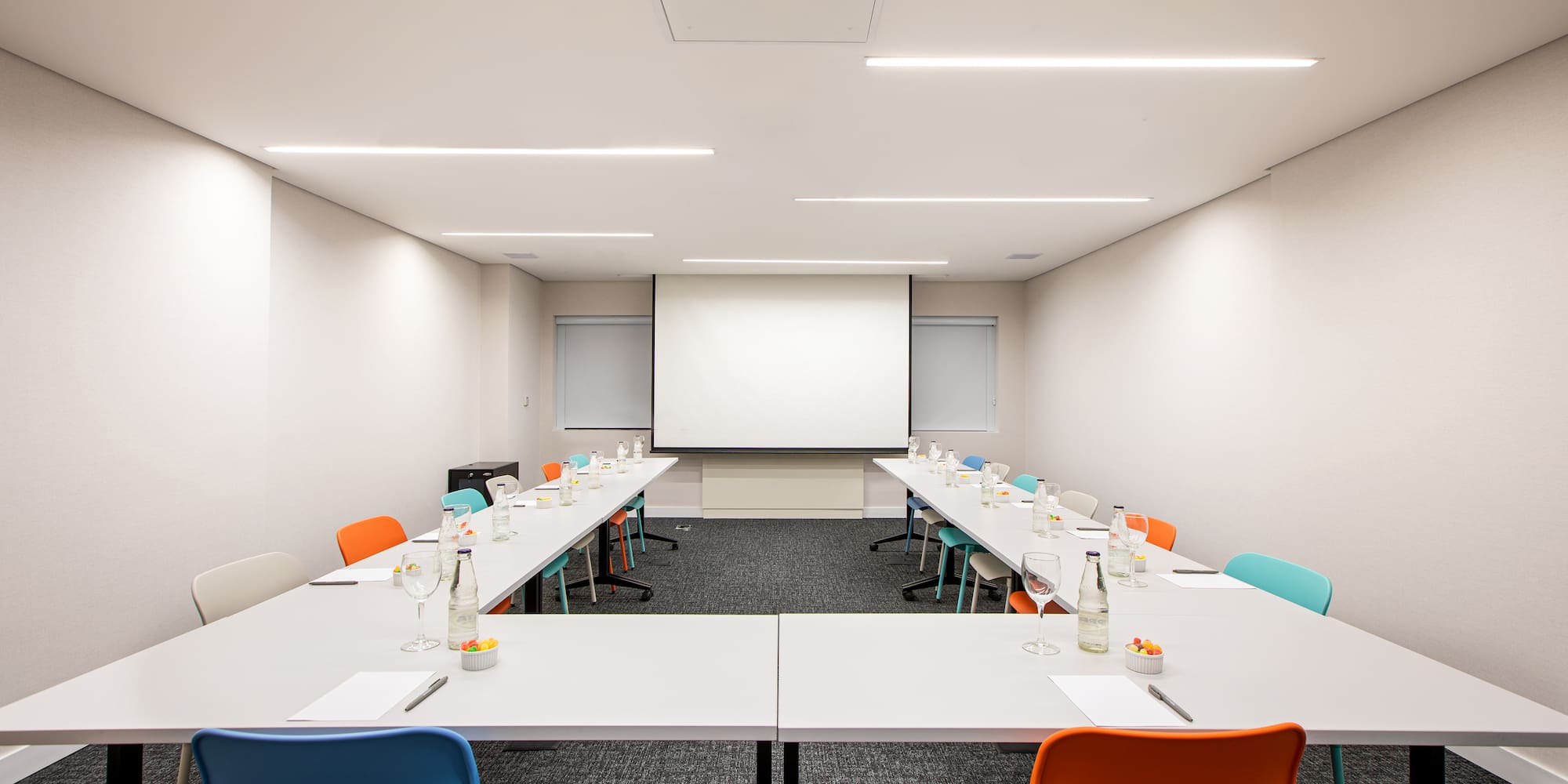 a room with tables and chairs
