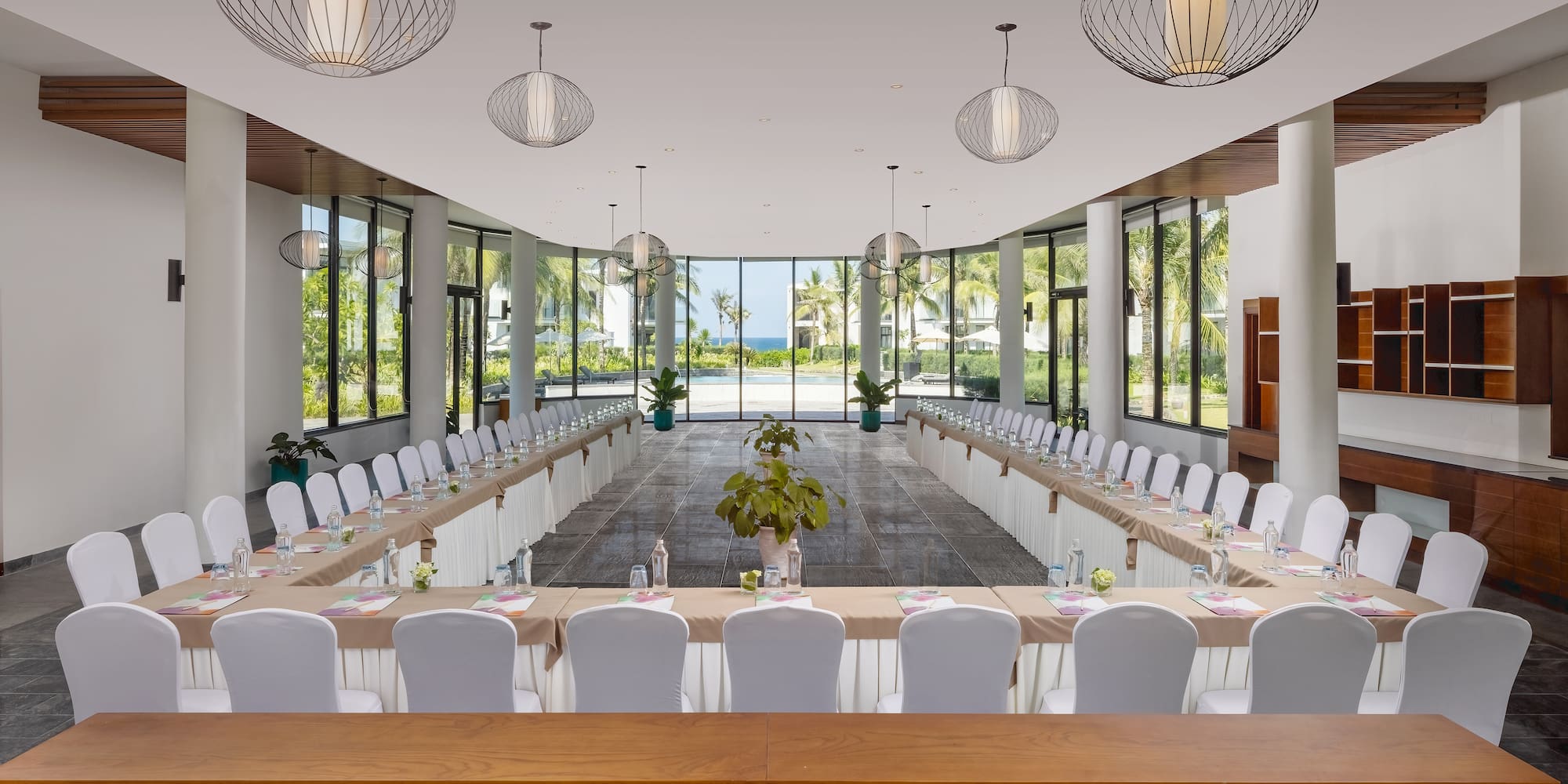 a room with tables and chairs