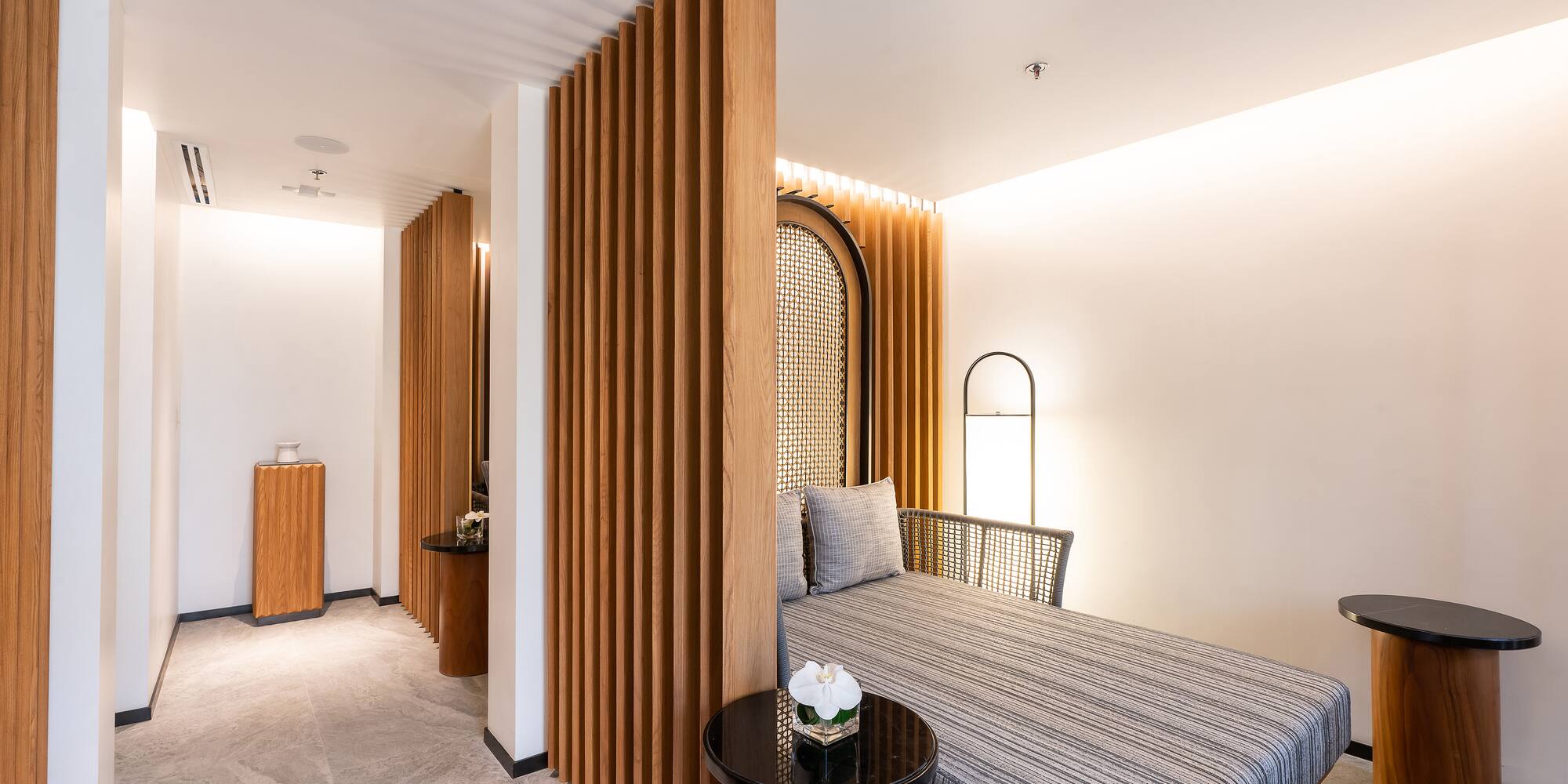 a room with a bed and a table